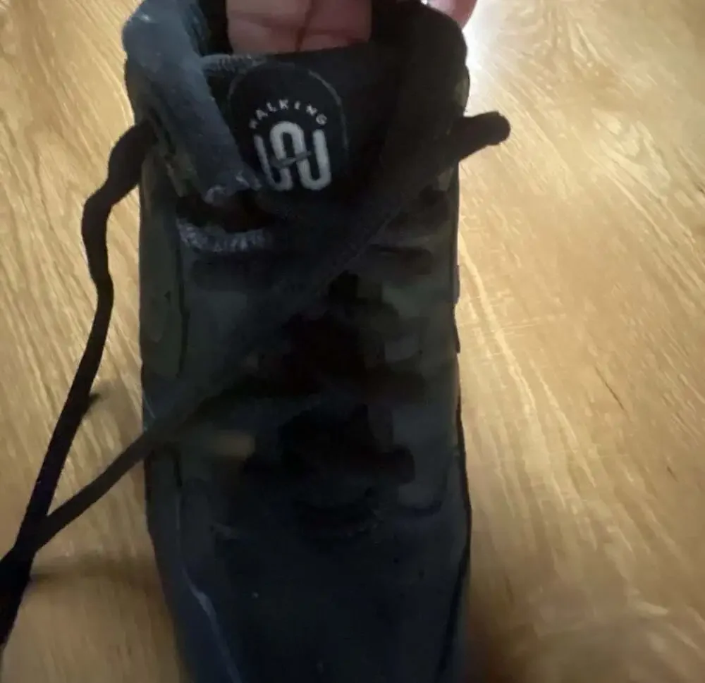 Nike Air Monarch IV Triple Black Walking Sneakers